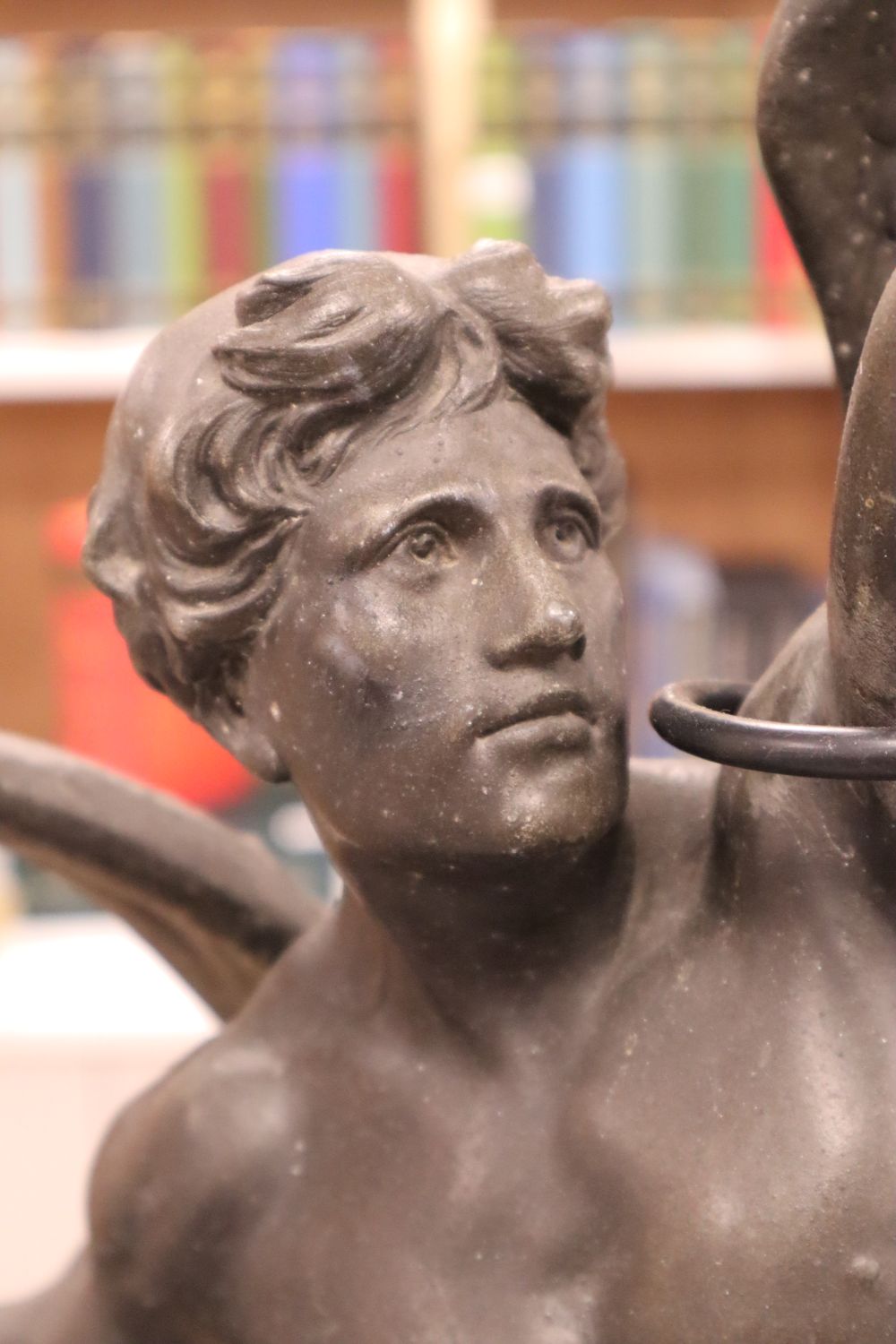 A large bronzed spelter figural lamp, entitled Le Genie Humain, converted to electric, 86cm